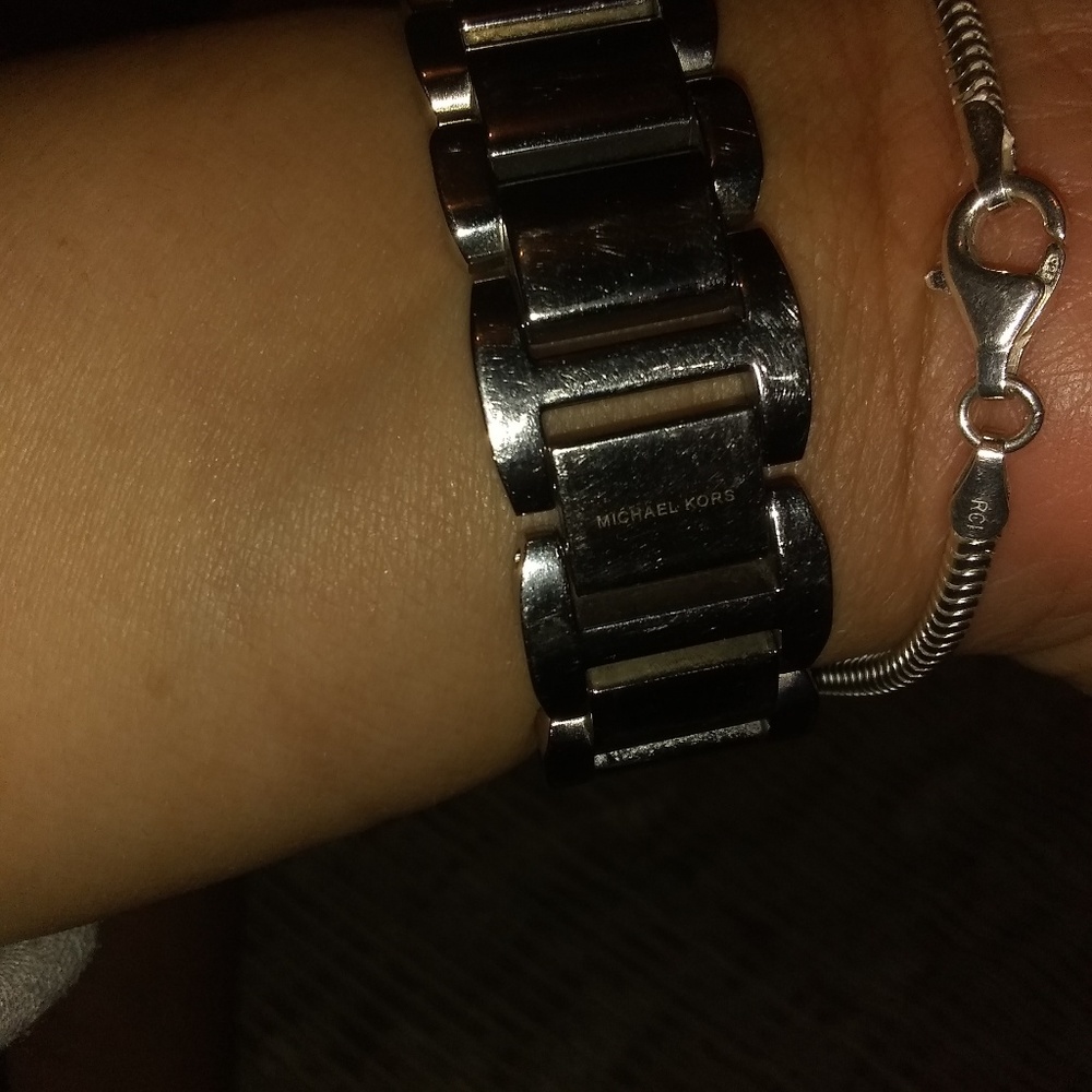 Mk silver watch I'm by the bank was the solution